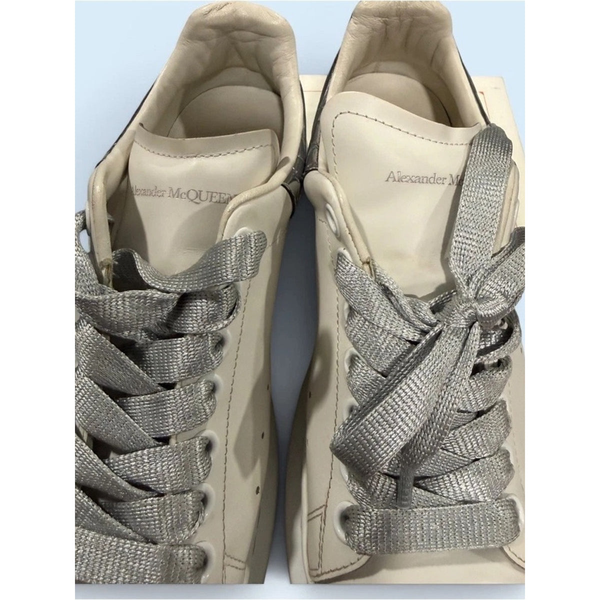 Pristine Alexander McQueen sneakers with Silver Heal Tab and Ribbon Laces